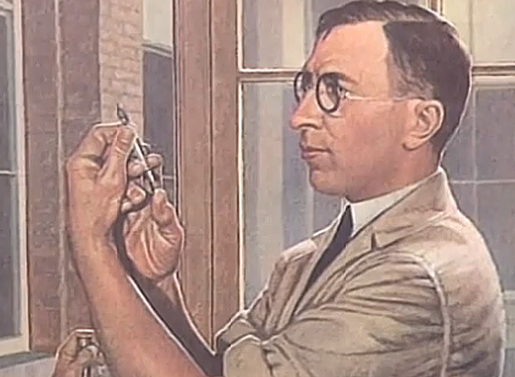 Sir Frederick Grant Banting köpenyben, szemüvegben felszív egy fecskendőt, Kép: cdnmedhall.org