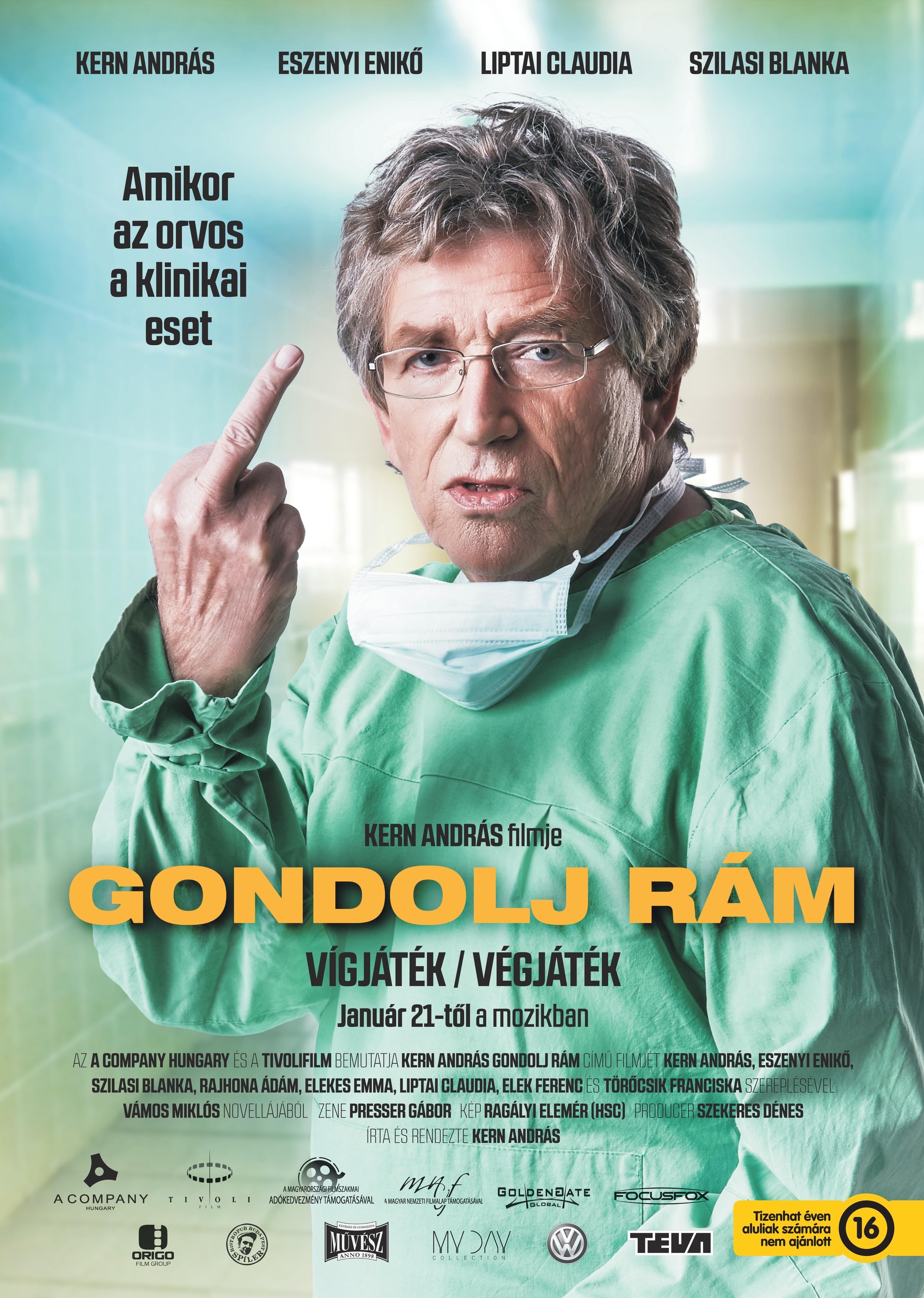 Filmplakát, Kern András orvosnak öltözve jobb kezének mutató újjával bemutat, Kép: sajtóanyag